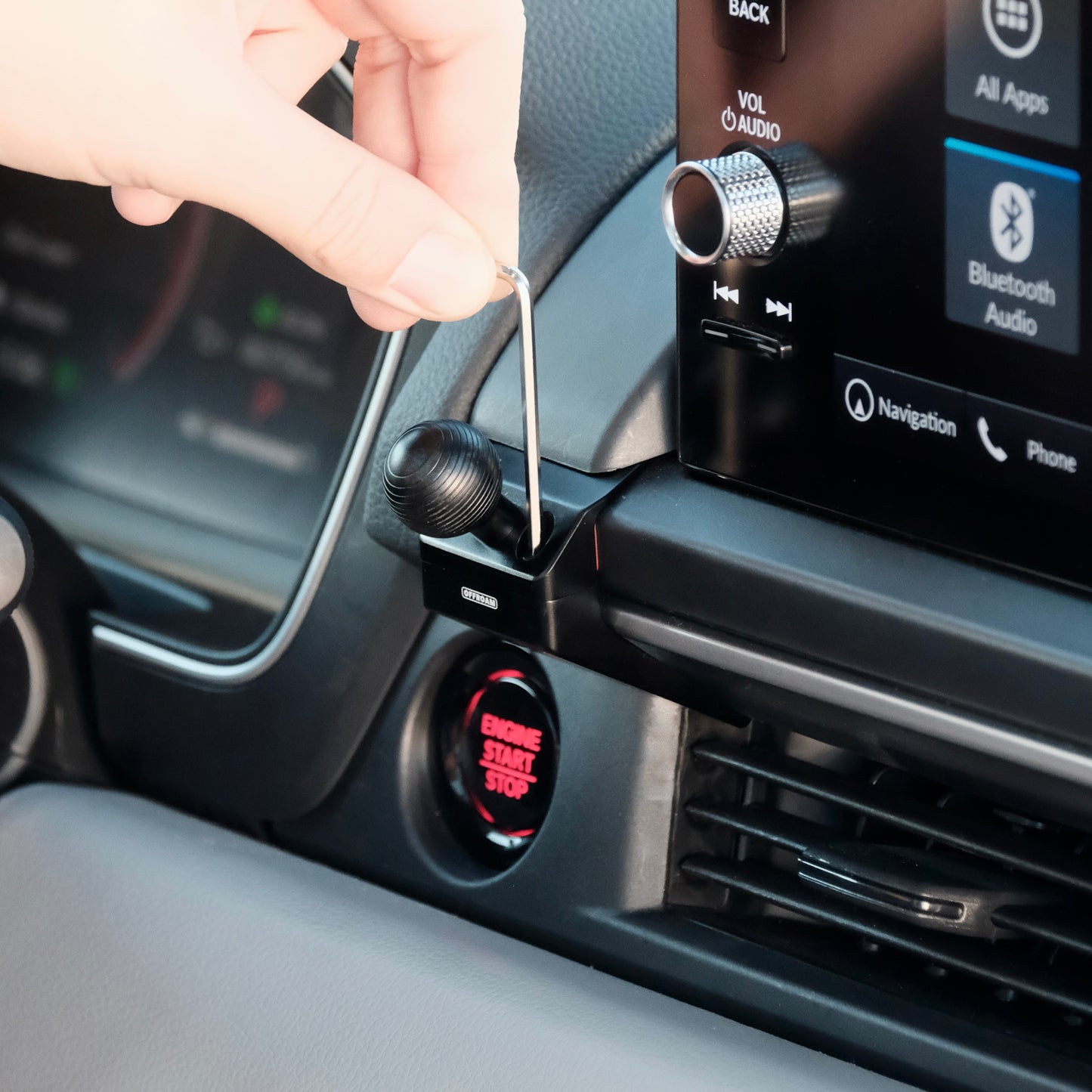 A mounting base installed securely in Honda Pilot 2023-2025 near display screen is a premium accessory that allows to securely mount phone. Installs easily into existing features without drilling or glue. Universal fit and secure hold on any road. Features 20mm ball to mount compatible device holders.