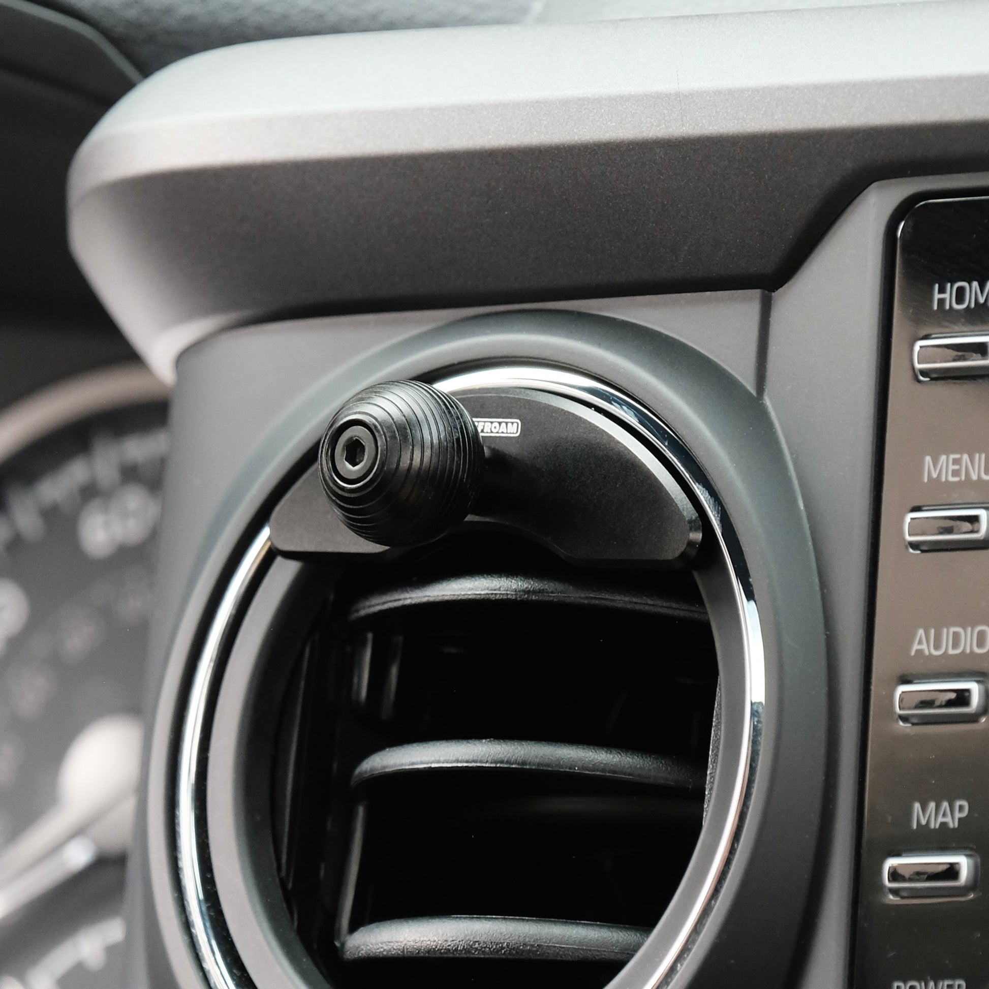 Toyota Tacoma 2016-2023 air vent with Offroam mounting base installed securely. Integrated 20mm ball for accessories mounting like phone, GPS, radio, CB radio