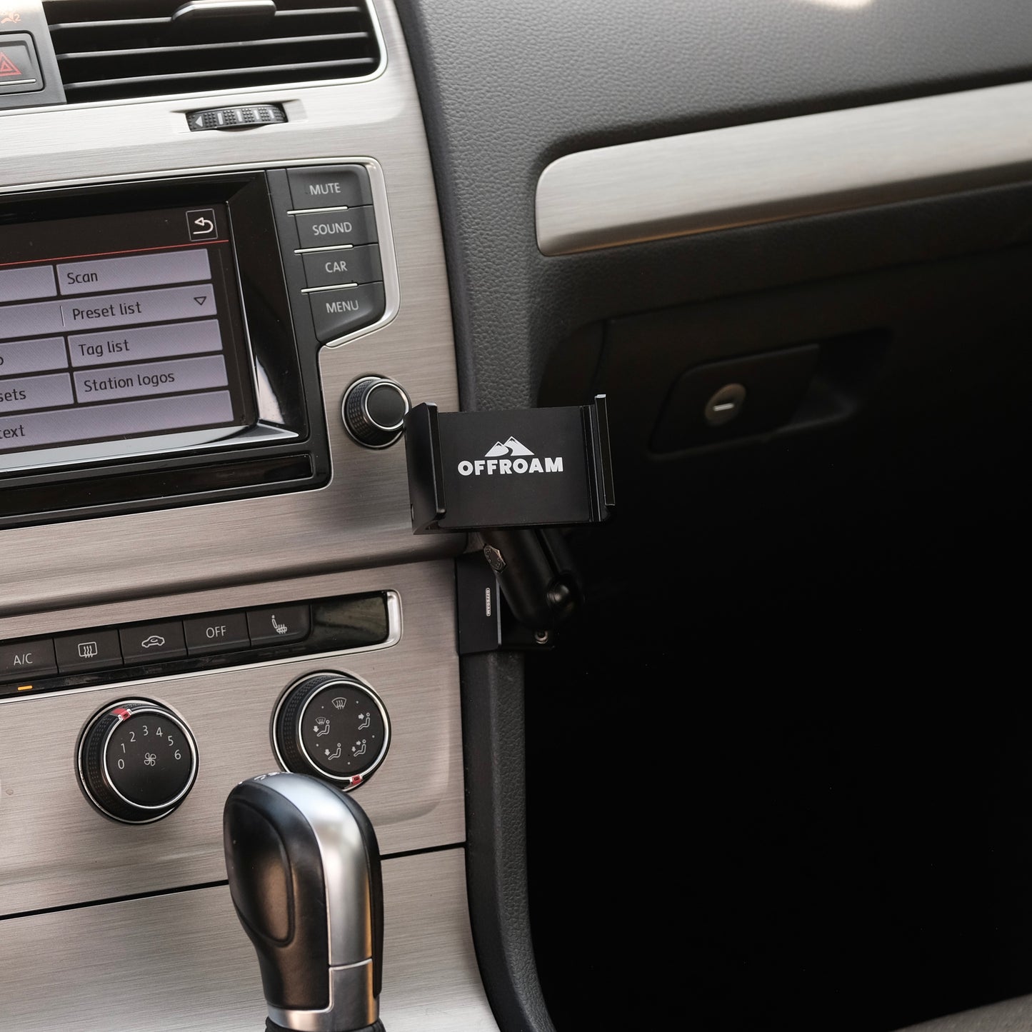 A phone mount installed securely in Volkswagen Golf Mk7 2015-2021 is a premium accessory that allows to mount phone. Installs easily into existing features without drilling or glue. Perfect positioning