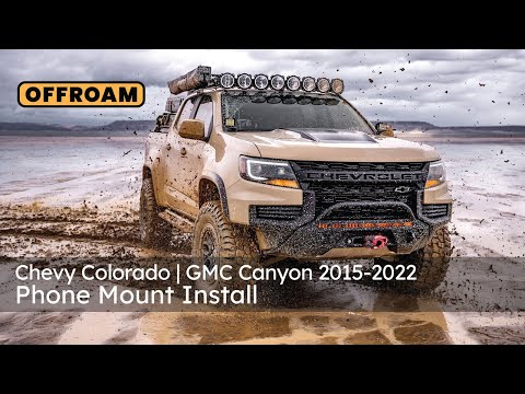 Video of Offroam Universal and MagSafe-compatible Phone Mount installation for Chevy Colorado | GMC Canyon 2015-2022. This premium phone mount installs easily without drilling or glue. Spring loaded Universal holder or MagSafe-compatible holder with high force magnets hold phone on any trail, road, or track. Perfect placement without blocking screens, driver view, or air flow. Fully adjustable positioning.