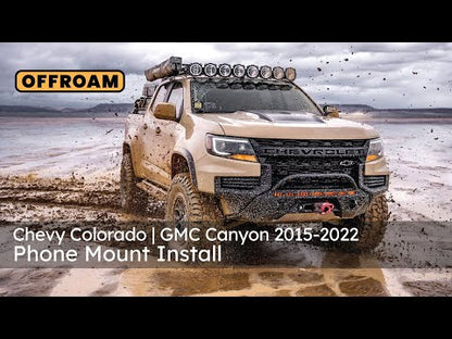 Video of Offroam Universal and MagSafe-compatible Phone Mount installation for Chevy Colorado | GMC Canyon 2015-2022. This premium phone mount installs easily without drilling or glue. Spring loaded Universal holder or MagSafe-compatible holder with high force magnets hold phone on any trail, road, or track. Perfect placement without blocking screens, driver view, or air flow. Fully adjustable positioning.