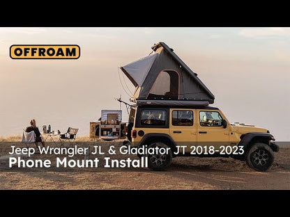 Video of Offroam Phone Mount installation for Jeep Wrangler 2018-2023 | Gladiator 2019-2023. This premium phone mount installs easily without drilling or glue. High force magnets hold phone on any trail, road, or track. Perfect placement without blocking screens, driver view, or air flow. Fully adjustable positioning.